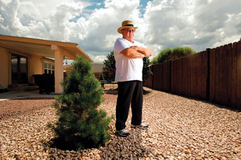  Buddy Jeffries is one of many residents of Gallup that area fed up with the smell coming from the wast treatment plant on the west side of town. Jeffries, a resident of the Sky West subdivision, say the smell can be so bad that he and his family can't stand to be in there backyard. &copy; 2011 Gallup Independent / Brian Leddy 